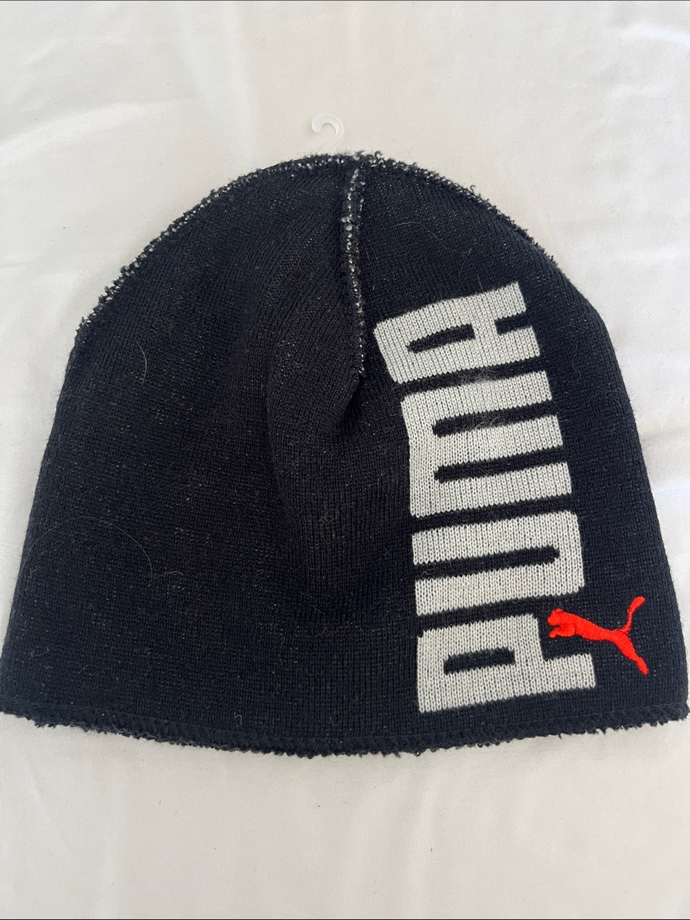 Puma Kids Black Beanie with White Branding and Red Puma Logo